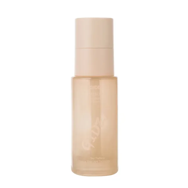 Beige frosted glass pump bottle with brush
