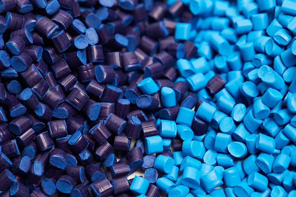 Blue PCR (Post-Consumer Recycled) plastic particles